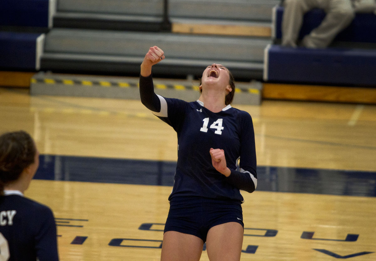 Senior Terese Cannon celebrates between points Nov. 1 at Gates Chili High School. Mercy defeated Penfield in five sets to win the sectional title, and Cannon was named Most Valuable Player in the tournament.